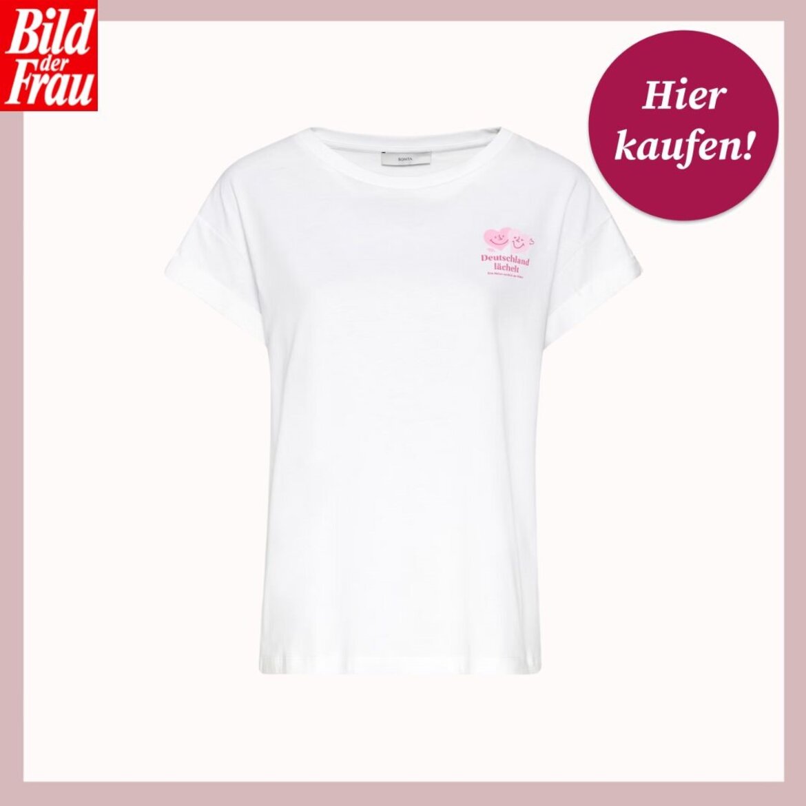 Weißes T-Shirt mit rosa Herzen und dem Schriftzug "Deutschland lächelt" von Bild der Frau, daneben ein Kreis mit "Hier kaufen!". | © Bonita