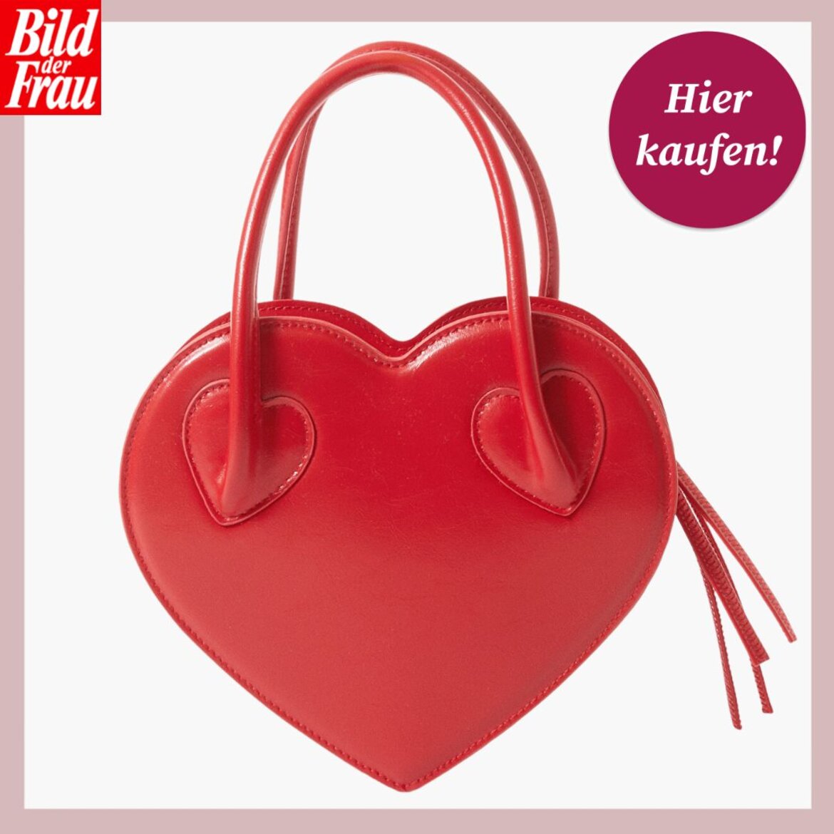 Rote Handtasche in Herzform mit zwei Henkeln und herzförmigen Details, vor weißem Hintergrund abgebildet. | © Monki